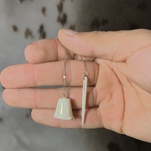 Alex Kilabuk (Panniqtuuq) needle and thimble earrings