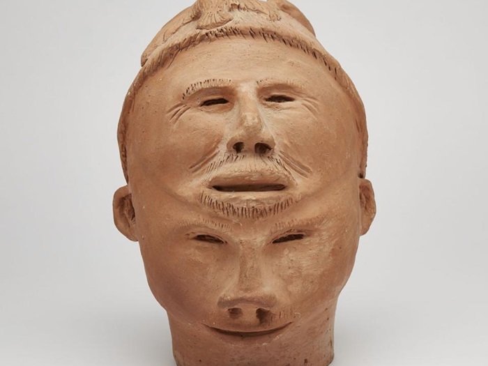 Two Faced Head with Climbing Figure and Bird (c. 1970)