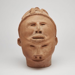 Two Faced Head with Climbing Figure and Bird (c. 1970)