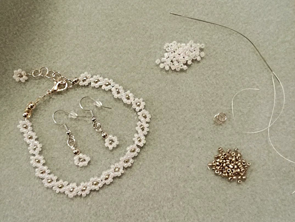 Pearlescent daisy earrings with matching daisy chain bracelet (2024)