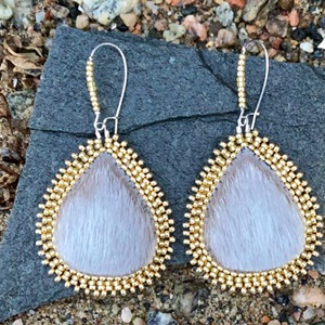 Small natural sealskin teardrops with gold beads (2021)