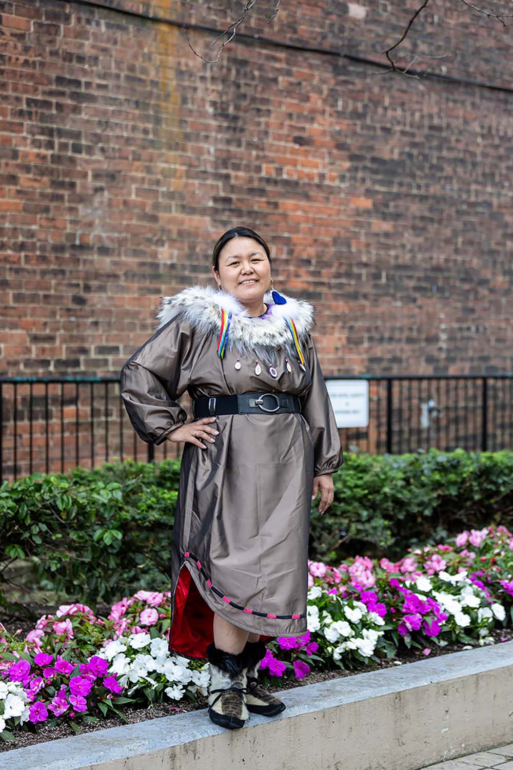 Brown "Caribou" Dress (2023) with Amaruq Sunburst Collar (2024) and Seal Heart Rainbow Fringe Earrings (2023)