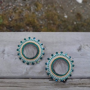 Untitled (Teal sealskin earrings) (2022)
