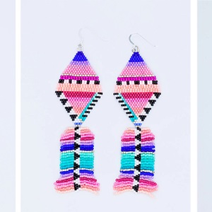 (from left) Fish Tail, Tutoyaktuk Skies Fish Tail and Signature Studs - Ocean Love earrings (2022)