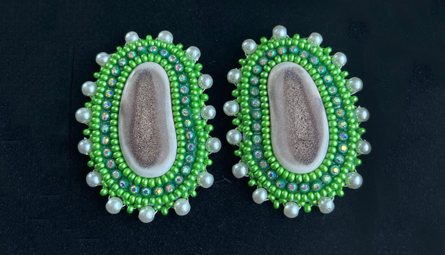 Green caribou antler earrings (2021)