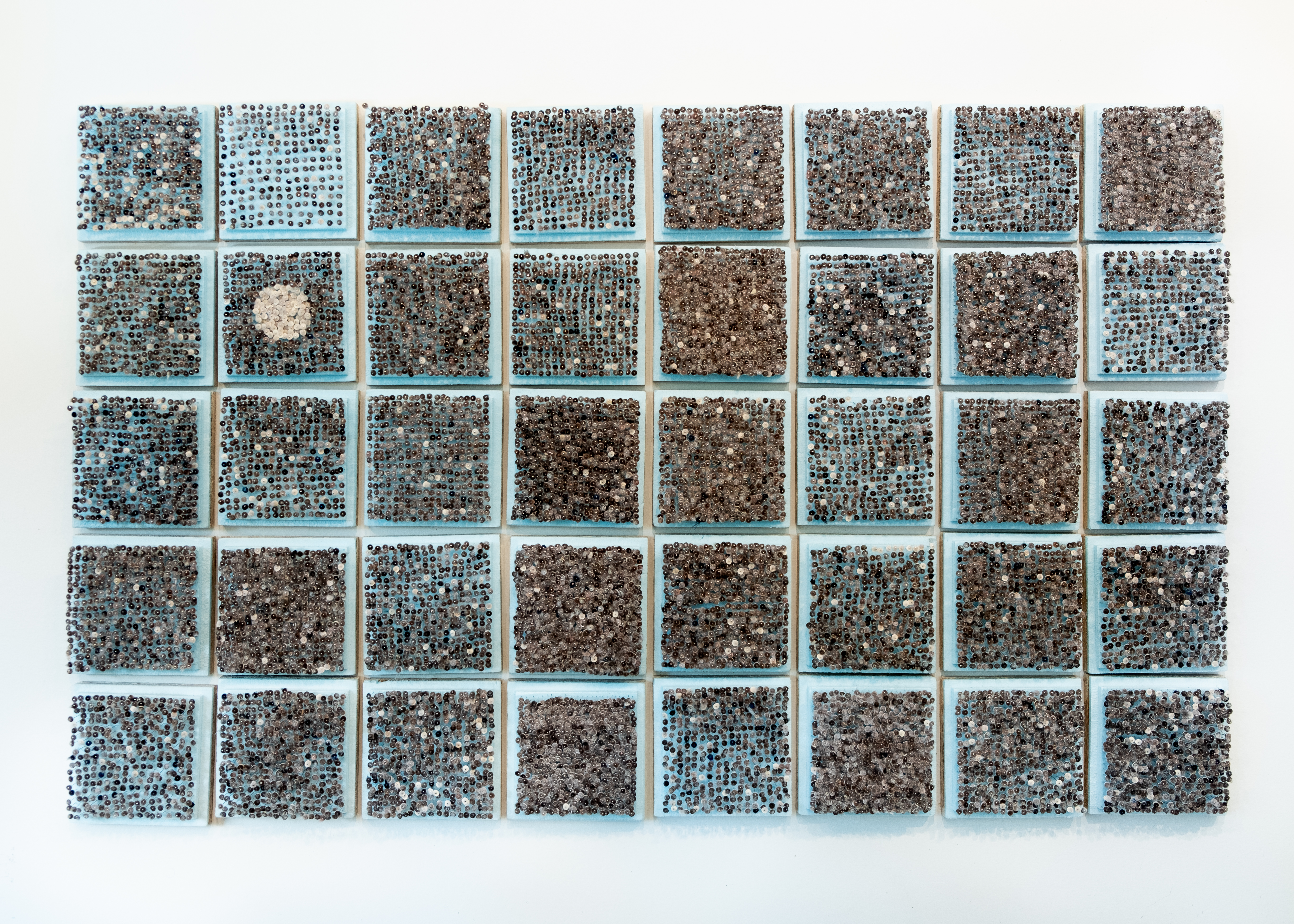 Maureen Gruben. Breathing Hole (detail), 2019. Dricore insulation board, stainless steel pins, sealskin, white cotton thread. 121.9 x 76.2 cm.  (2)