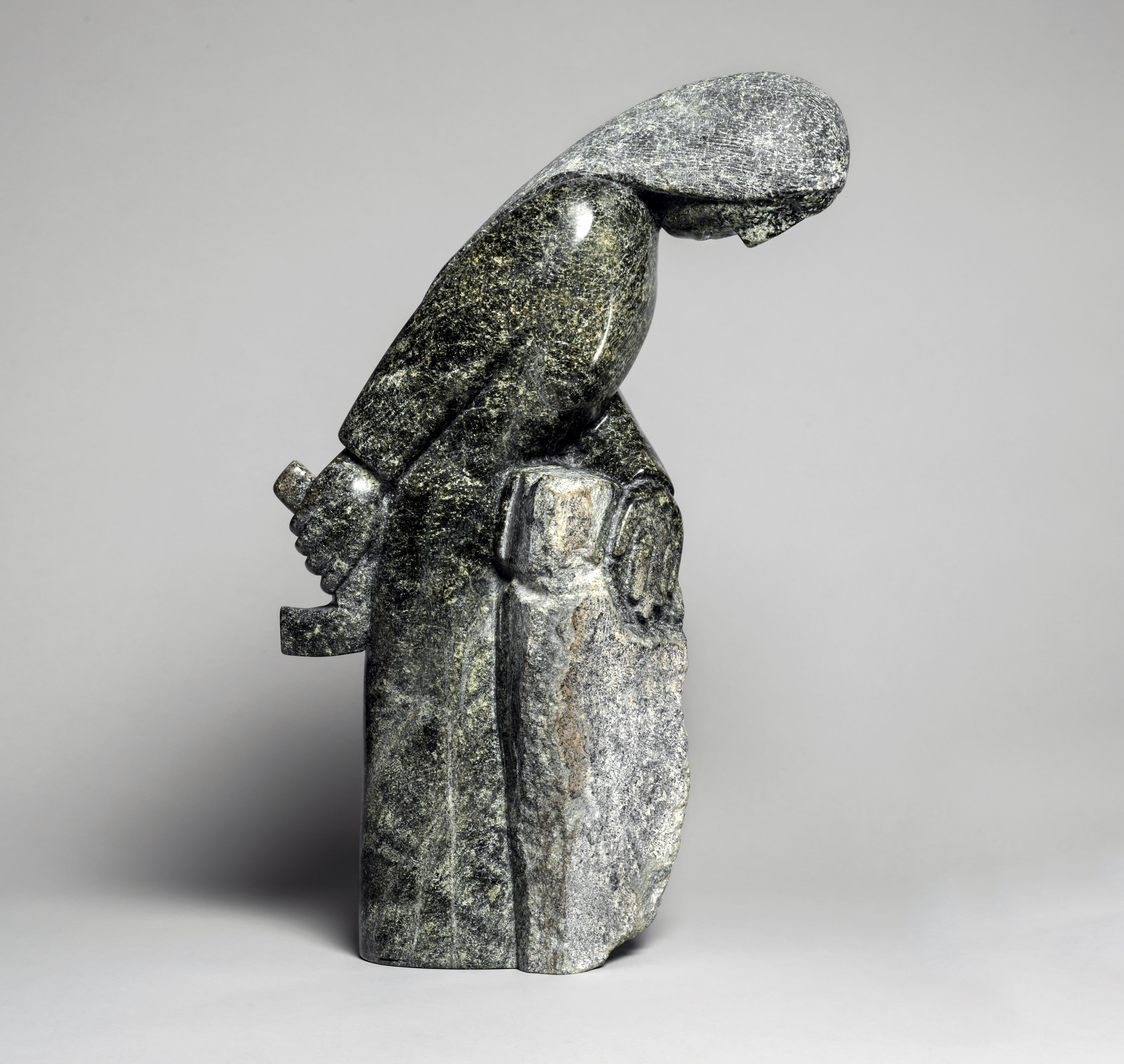 TunnillieOvilooWomanCarvingStone