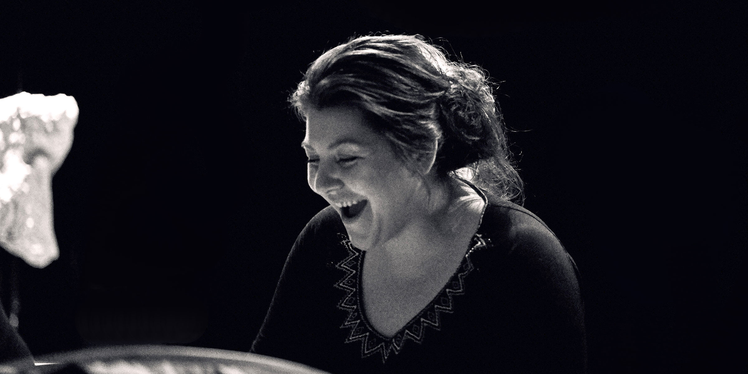 Niap drum dancing at the opening of her exhibition